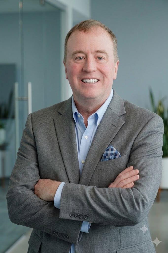Smiling male medical legal consultant standing in modern office setting